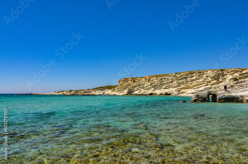 Fototapeta Naklejka Na Ścianę i Meble -  sandstone rocks and pebble cove beach of Delikli Koy near Alacati (Izmir province, Turkiye)	