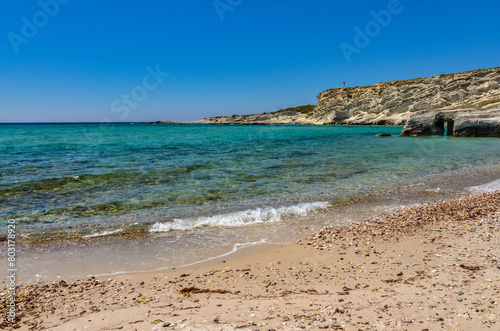 Fototapeta Naklejka Na Ścianę i Meble -  sandstone rocks and pebble cove beach of Delikli Koy near Alacati (Izmir province, Turkiye)	
