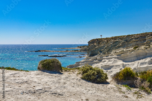 Fototapeta Naklejka Na Ścianę i Meble -  sandstone rocks and pebble cove beach of Delikli Koy near Alacati (Izmir province, Turkiye)	
