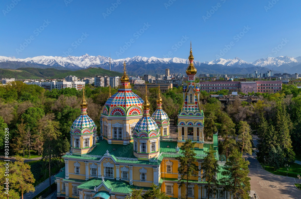 Fototapeta premium Quadcopter view of the Orthodox wooden Ascension Cathedral built in 1907 in the Kazakh city of Almaty on a spring evening