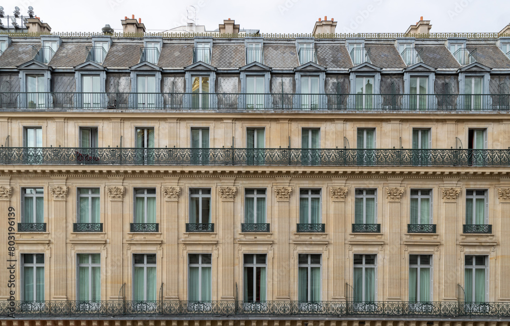 Beautiful typical Parisian building set on a city center street. Paris, France.