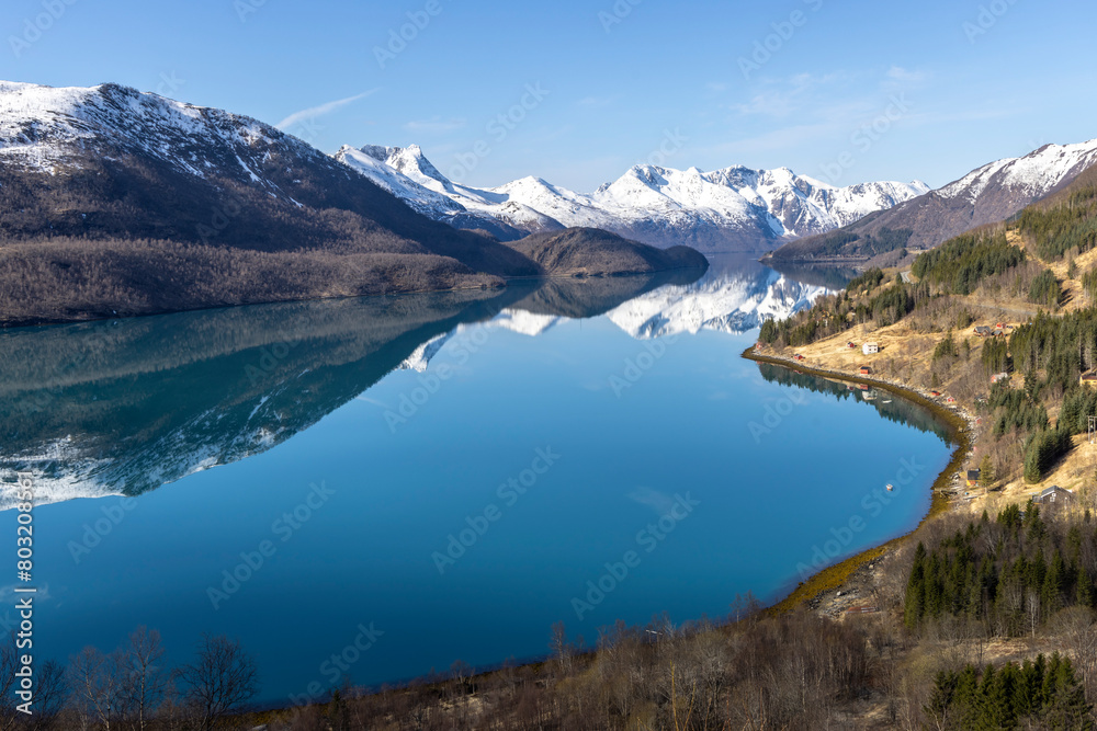 Panoramic drone view of Holandsfjord and Nordfjord in Nordland county. In the background is the Svartisen glacier, Norway's second largest glacier