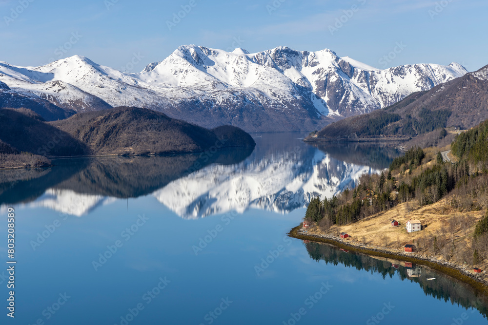 Panoramic drone view of Holandsfjord and Nordfjord in Nordland county. In the background is the Svartisen glacier, Norway's second largest glacier