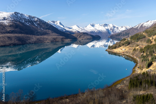 Obraz na płótnie Panoramic drone view of Holandsfjord and Nordfjord in Nordland county. In the background is the Svartisen glacier, Norway's second largest glacier w salonie