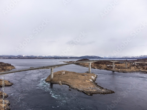 Obraz na płótnie Aerial drone view of world's strongest tidal whirlpools - maelstroms - between Saltfjorden and Skjerstad Fjord t in Saltstraumen, Norway w salonie