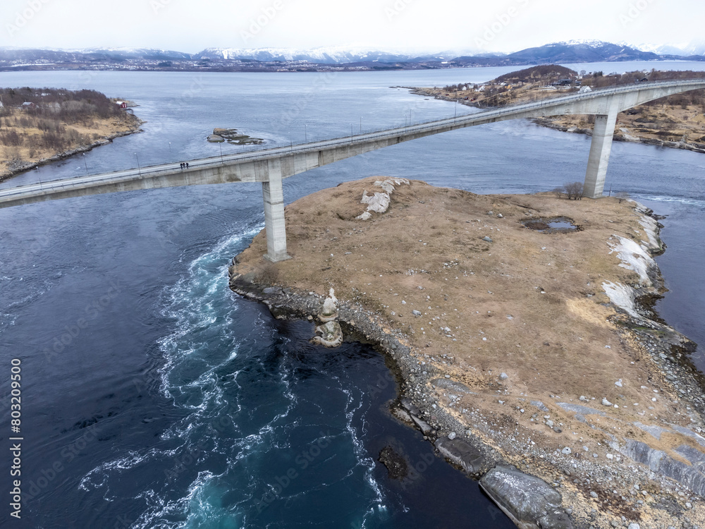 Aerial drone view of world's strongest tidal whirlpools - maelstroms - between Saltfjorden and Skjerstad Fjord t in Saltstraumen, Norway