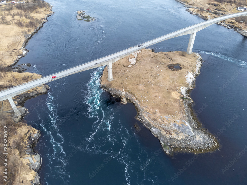 Aerial drone view of world's strongest tidal whirlpools - maelstroms - between Saltfjorden and Skjerstad Fjord t in Saltstraumen, Norway