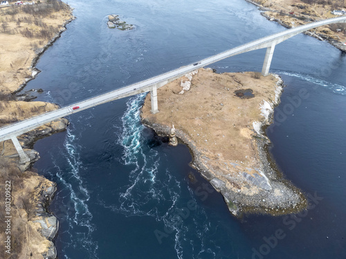 Obraz na płótnie Aerial drone view of world's strongest tidal whirlpools - maelstroms - between Saltfjorden and Skjerstad Fjord t in Saltstraumen, Norway w salonie