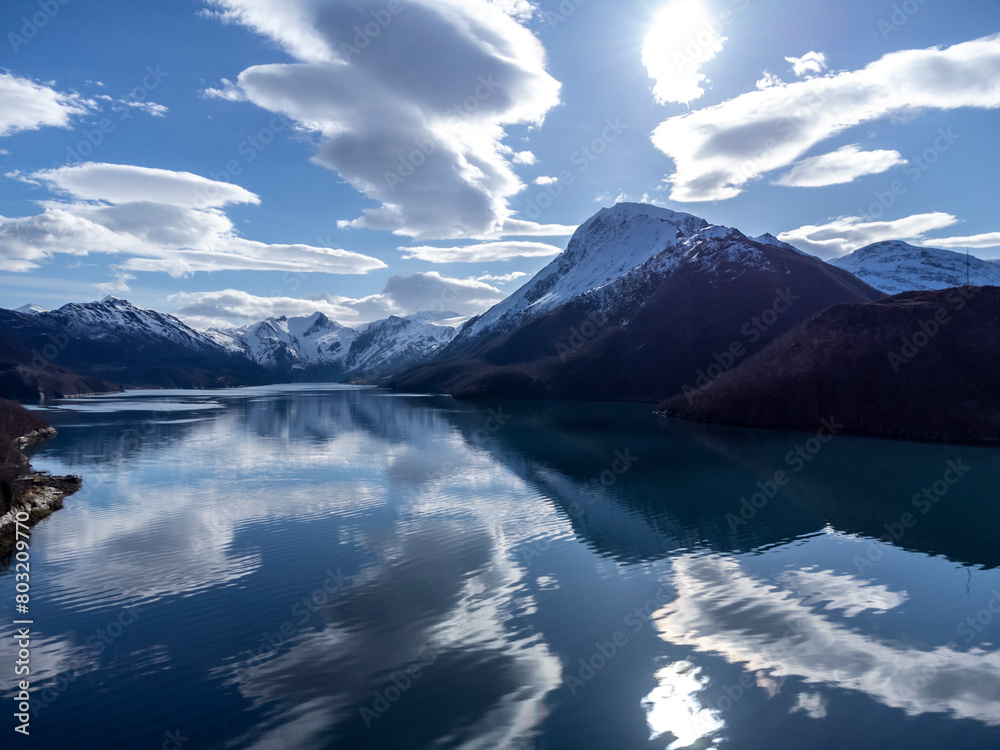 Panoramic drone view of Holandsfjord and Nordfjord in Nordland county. In the background is the Svartisen glacier, Norway's second largest glacier