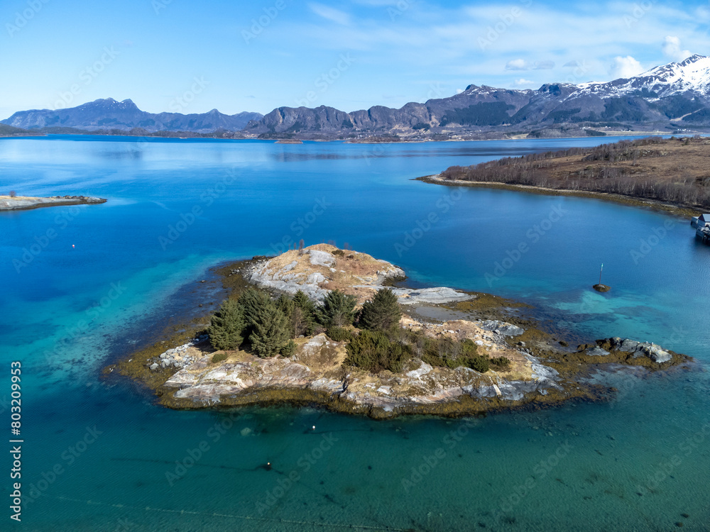 Drone shot over the islands of Storoya, Hestoya, Amnoya and Gronnoya in Nordland county, Norwa