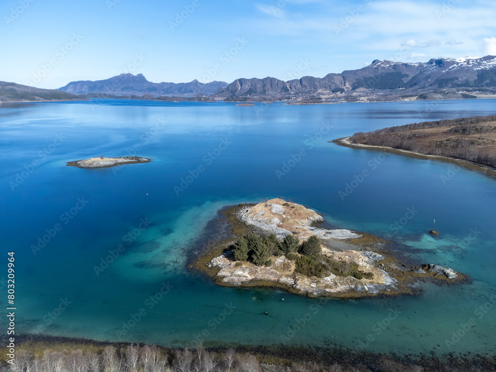 Drone shot over the islands of Storoya, Hestoya, Amnoya and Gronnoya in Nordland county, Norwa