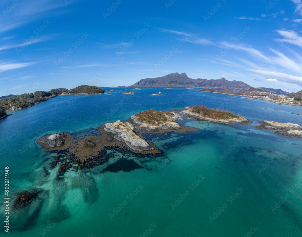 Drone shot over the islands of Storoya, Hestoya, Amnoya and Gronnoya in Nordland county, Norwa