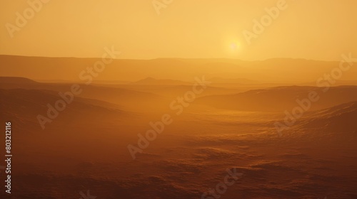 Stunning desert sunset scene showcasing majestic hills and peaceful terrain © Yusif