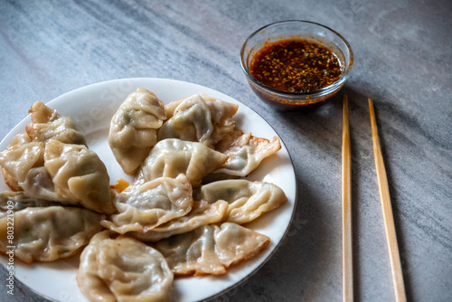 Serving Gyoza dumplings, a local Chinese and Japanese common food