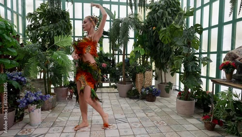 The feminine beauty and grace of this woman seem to permeate every corner of the studio, turning it into a magical space full of life and energy.