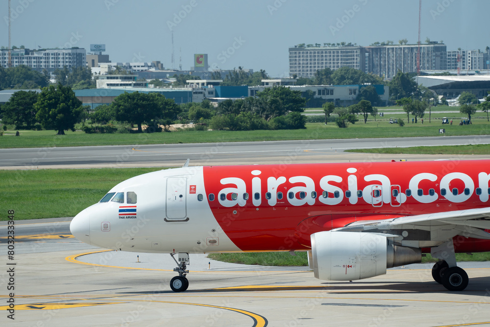 BANGKOK, THAILAND - AUGUST 18, 2023: Side view of AirAsia aircraft in ...