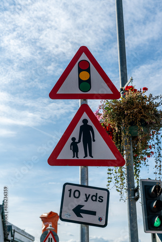 Traffic lights signal sign with pedestrian sign