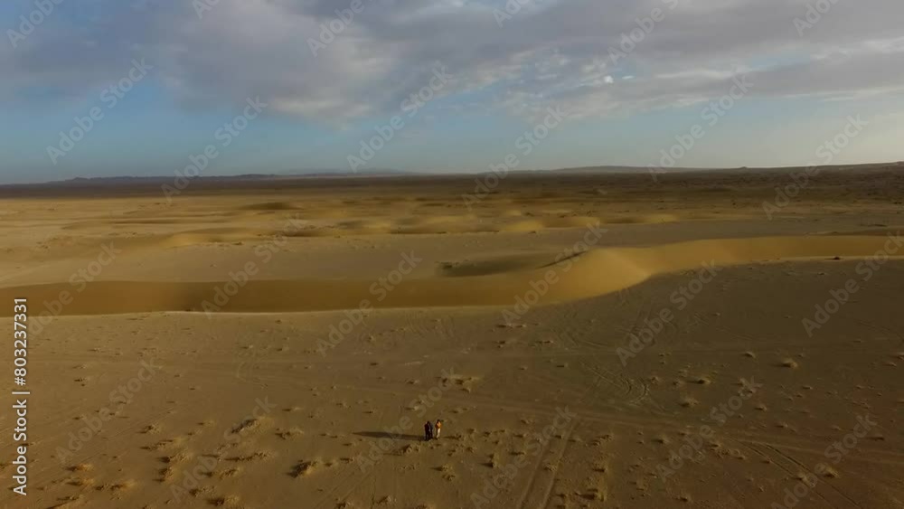 Beautiful sand dunes in attractive desert. Flying by drone on the sand hills. High resolution and quality aerial footage. Beautiful sand dunes in attractive desert. Flying by drone on the sand hills. High resolution and quality aerial footage.