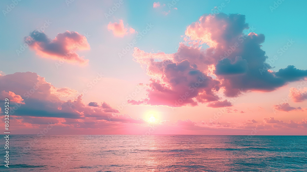 Beautiful sunset over the ocean with pink and blue sky Beautiful sunset over the ocean with pink and blue sky