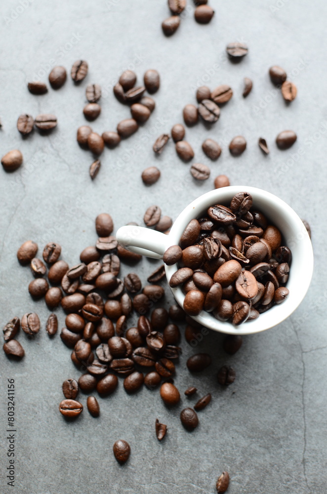 coffee beans on a wooden grey background