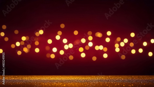 Christmas and New Year winter holiday background. Scattering of golden particles on dark vinous blurred bokeh festive background with copy space for text. photo