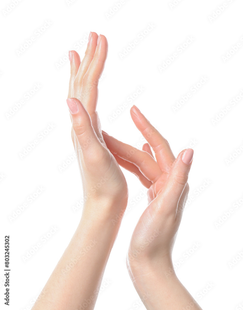 Woman applying cream on her hand against white background, closeup Woman applying cream on her hand against white background, closeup
