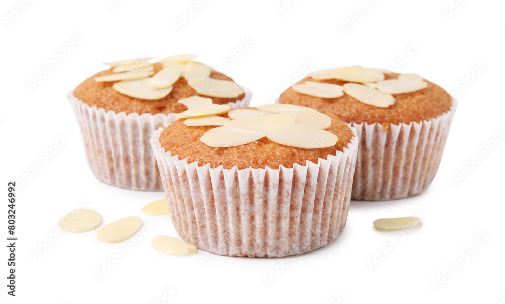 Muffins with fresh almond flakes isolated on white