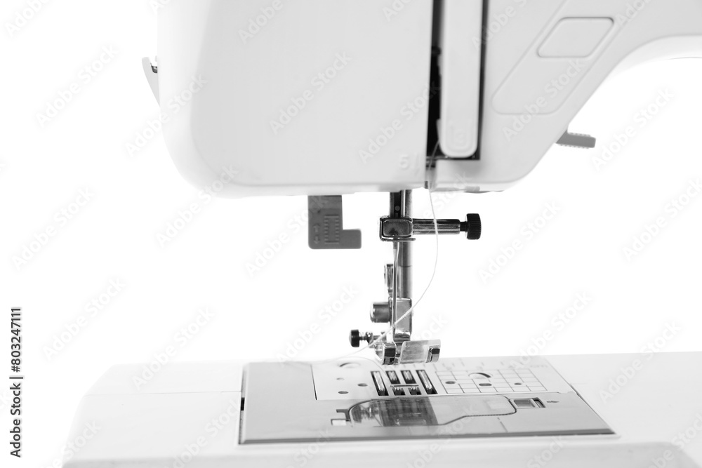 One modern sewing machine isolated on white
