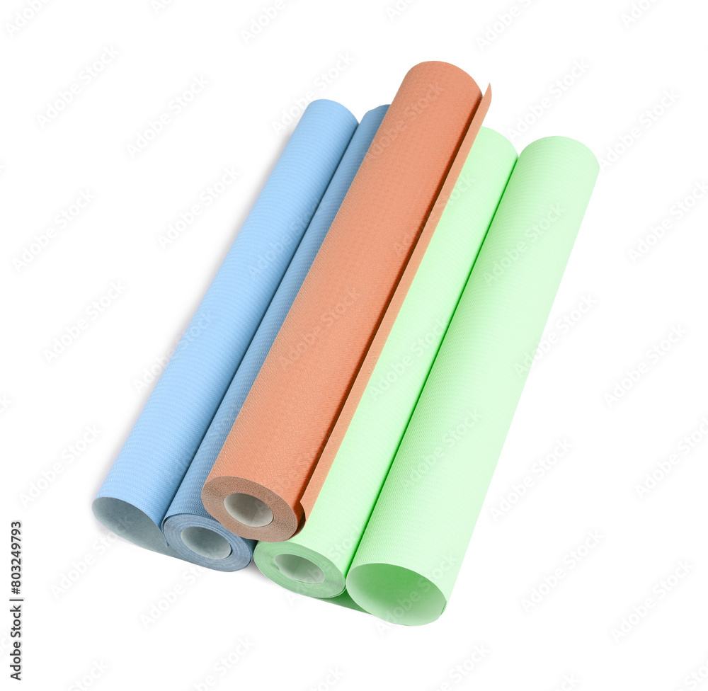 Different colorful wallpaper rolls isolated on white Different colorful wallpaper rolls isolated on white