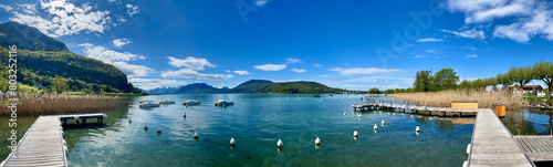 Haute-Savoie, France, 04-25-2024: panoramic view of Annecy lake, the second largest in France, known for being the cleanest in Europe due to strict environmental regulations in place since the 1960s photo