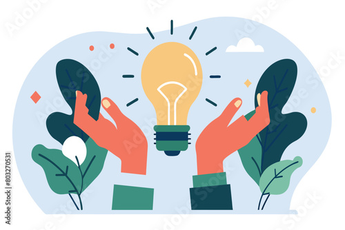 Two hands cradling a glowing light bulb with foliage accents
