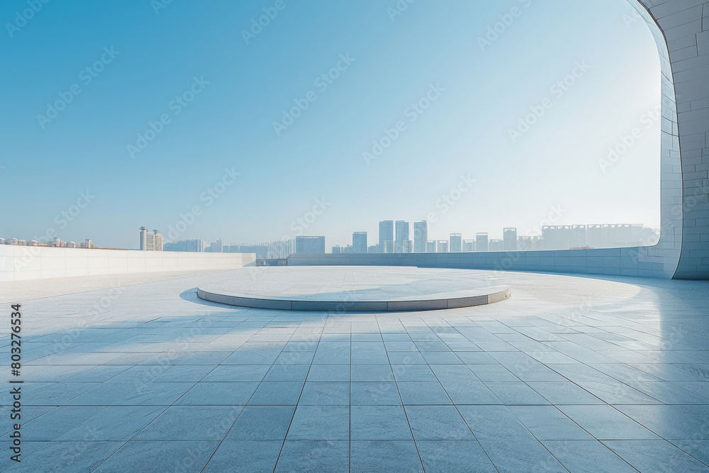 Fototapeta premium Concrete outdoor square building, The modern urban skyline is in the background.