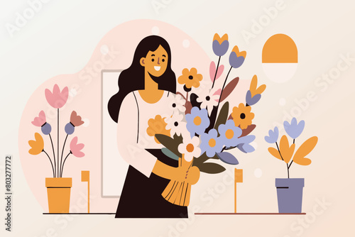 A smiling woman holds a bouquet; soft sunset light fills the room