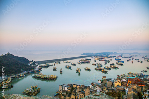 Xiaoruo Village, Wenling City, Taizhou City, Zhejiang Province - fishing village and fishing port at sunrise photo