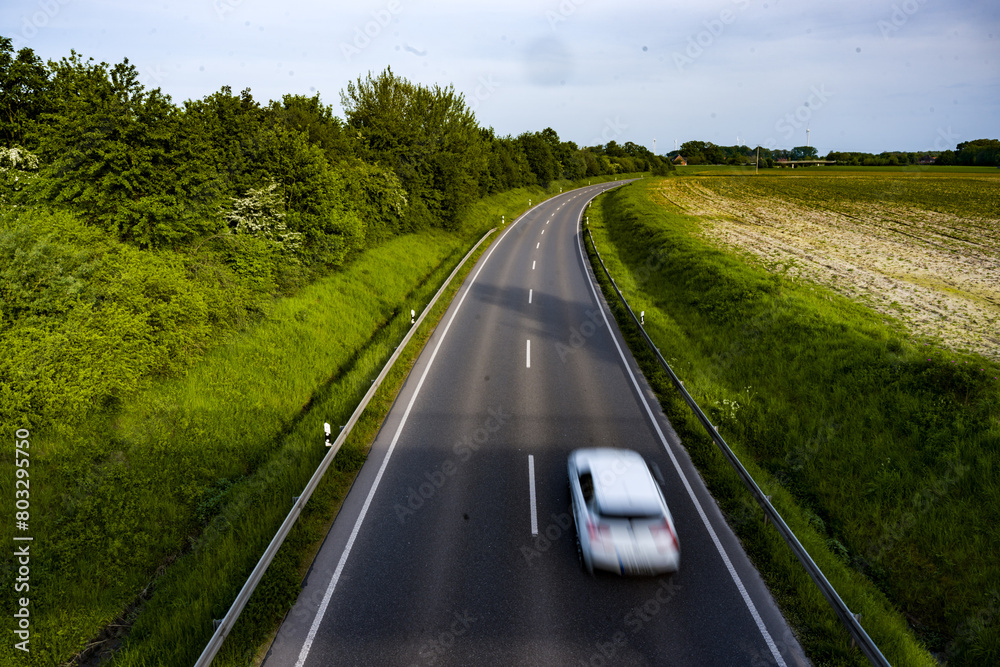 car driving on a highway car driving on a highway