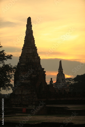 Historical and religious architecture of Thailand - ruins of old Siam capital Ayutthaya. View to brick remains of Wat Chaiwatthanaram temple 