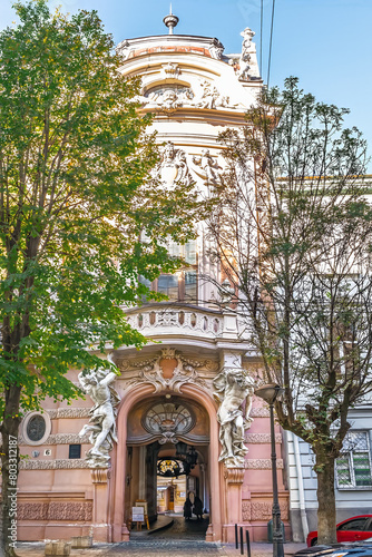 Lviv, Ukraine -November 2,2023: Decorative facade of the House of Scientists in Lviv - vertical view from the outside on a sunny day. Neo-baroque building by Ferdinand Fellner and Hermann Helmer, 1898 photo