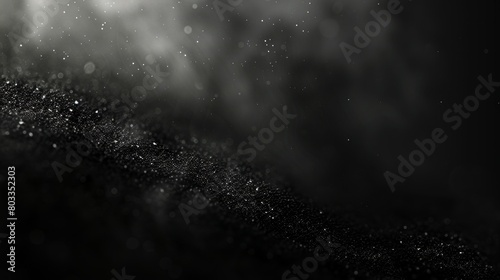 Dark and mysterious black grainy gradient with a noise texture, perfect for blurred background elements in headers, posters, and banner designs