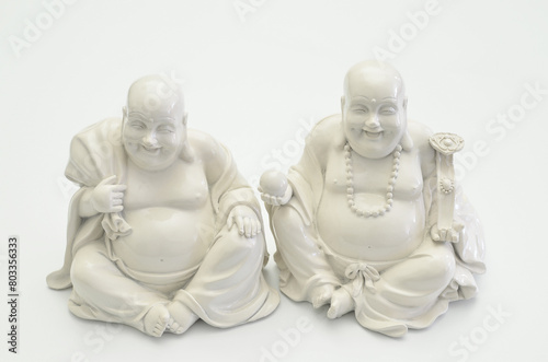 Still life with two white Buddhas