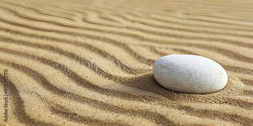 white pebble stone on the sand Zen garden with raked sand and round stones close up Stone on the sand with patterns Zen concept