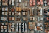 Aerial view of stacked hardware on a factory hardstand, revealing organised industrial materials