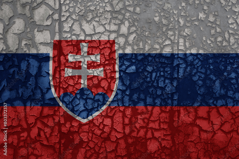 flag of slovakia on a grunge vintage metal rusty cracked wall background
