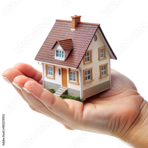 Hand Holding a Small Model House With a Transparent Background