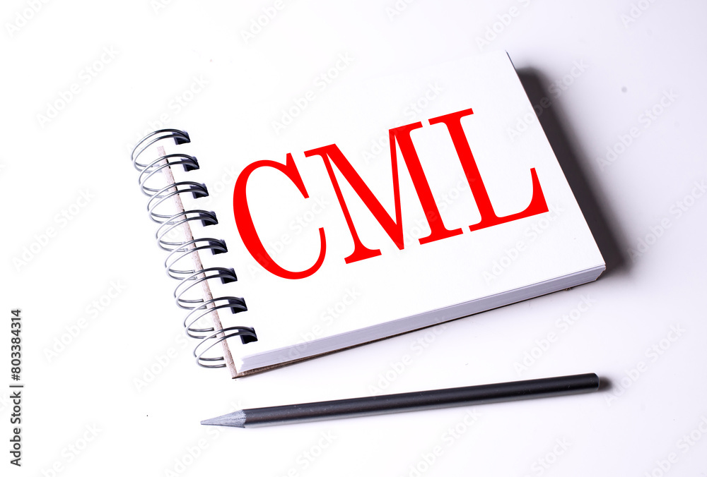CML-CAPITAL MARKET LINE word on notebook on white background CML-CAPITAL MARKET LINE word on notebook on white background