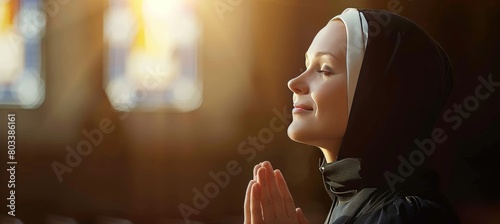 Serene scene  caucasian nun in black habit devoutly praying inside a peaceful church environment photo
