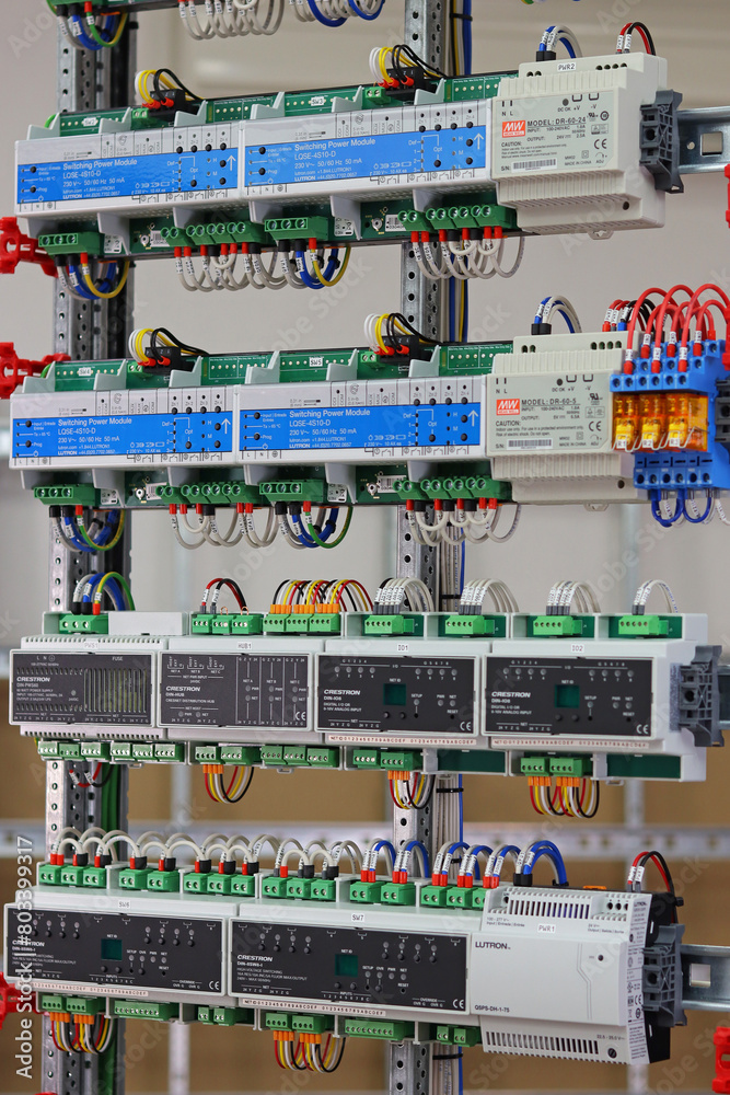 Electronic control modules for apartment automation are installed in an ...