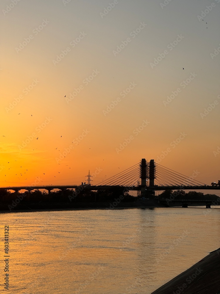 Obraz premium Sunset over river