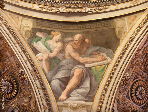 MILAN, ITALY - MARCH 5, 2024: The baroque fresco of St. John the Evangelist from cupola of church Chiesa di San Vittore al Corpo Guglielmo Caccia - Moncalvo (1568 – 1625) photo
