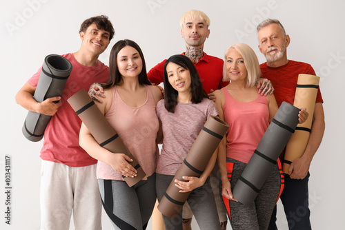 Group of sporty people with...