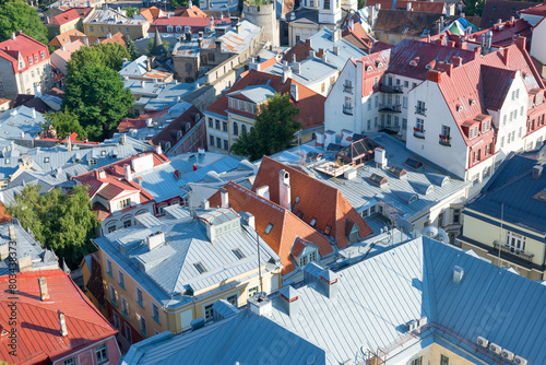 Billede på lærred top view of rusty and red tile roofs of city Tallinn, Estonia
